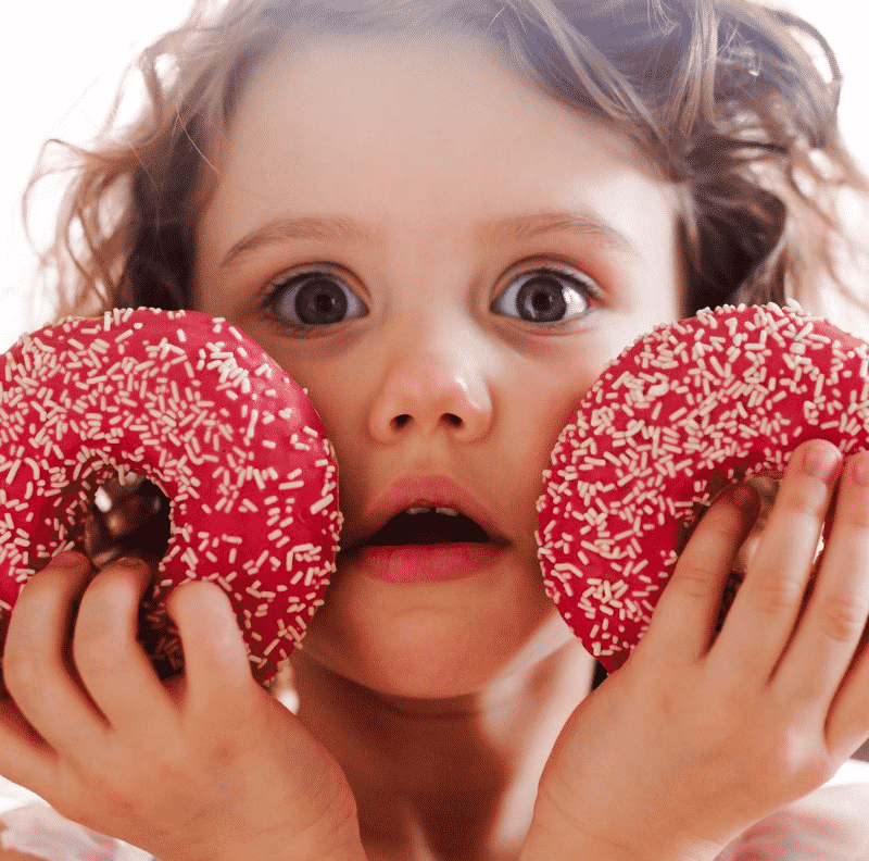 girl with doughnuts